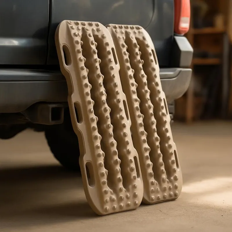 Generic editorial illustration of traction boards and recovery accessories, not a verified listing